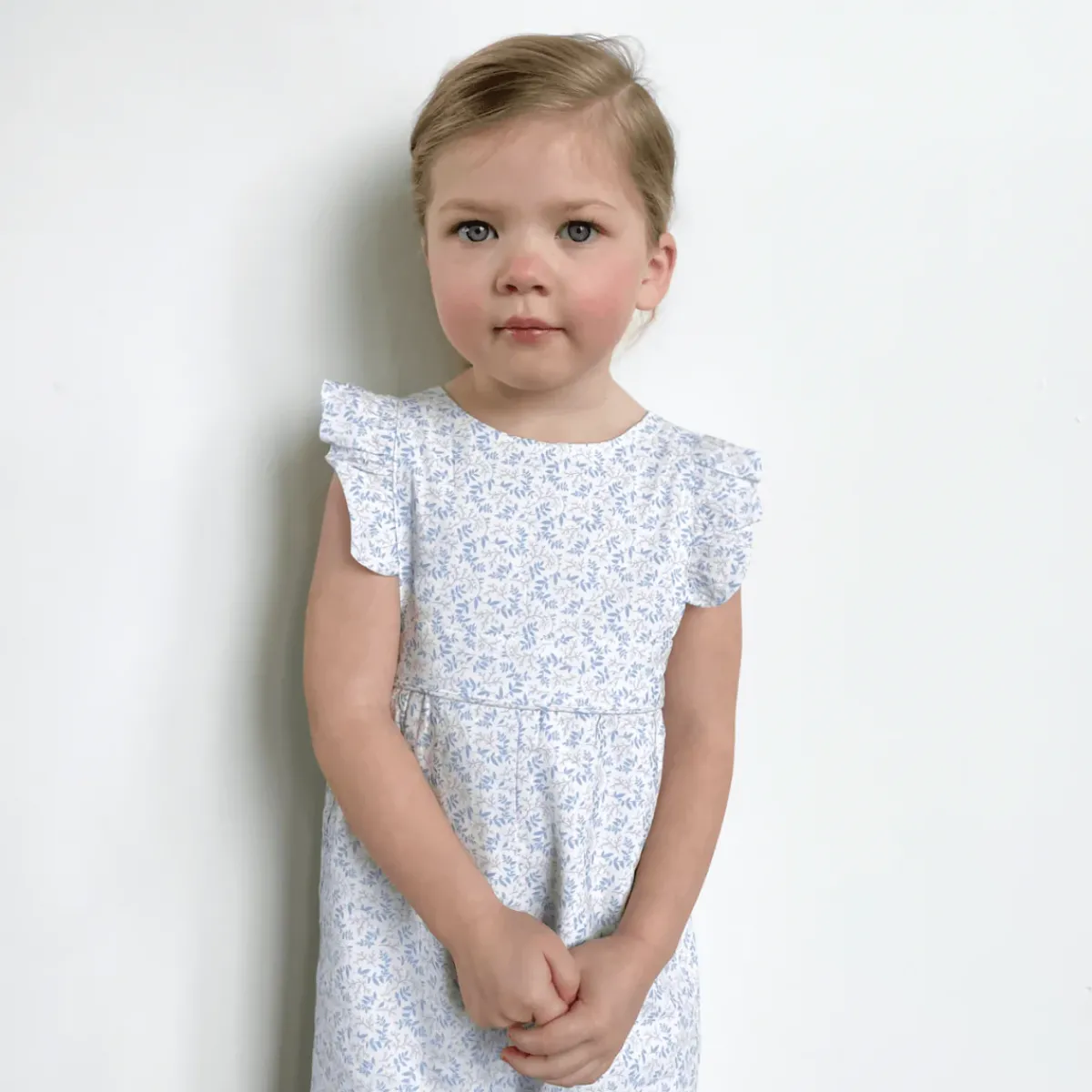 baby_girls_pinafore_rompe_1.webp minnow Rompers<Baby Girls Pinafore Romper Briland Blue Botanic
